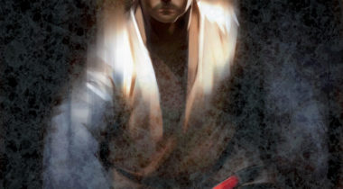 A man with a beard and white robe holding a wrench.