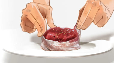 A person is cutting meat on top of a plate.